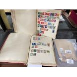 Two Commonwealth stamp albums and loose.