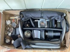 Box with cameras and watches.