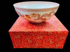 Large Chinese eggshell porcelain bowl decorated with iron red dragons and stylised design,