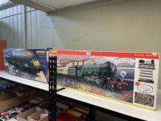 Two boxed model train sets, GNER225 and Flying Scotsman.