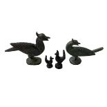 Four Chinese bronze bird shaped weights.