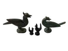 Four Chinese bronze bird shaped weights.