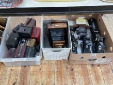 Collection of vintage cameras including Lancaster plate camera.