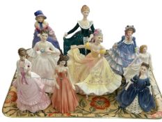 Eight Royal Doulton and one Royal Worcester figures.