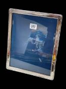 Large silver easel photograph frame, Sheffield 1992, 28.5cm by 23.5cm.