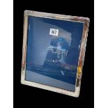 Large silver easel photograph frame, Sheffield 1992, 28.5cm by 23.5cm.