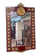 Continental rectangular bevelled wall mirror, the frame with applied roundel and putti decoration,