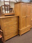 Contemporary light oak two door wardrobe with base drawer,
