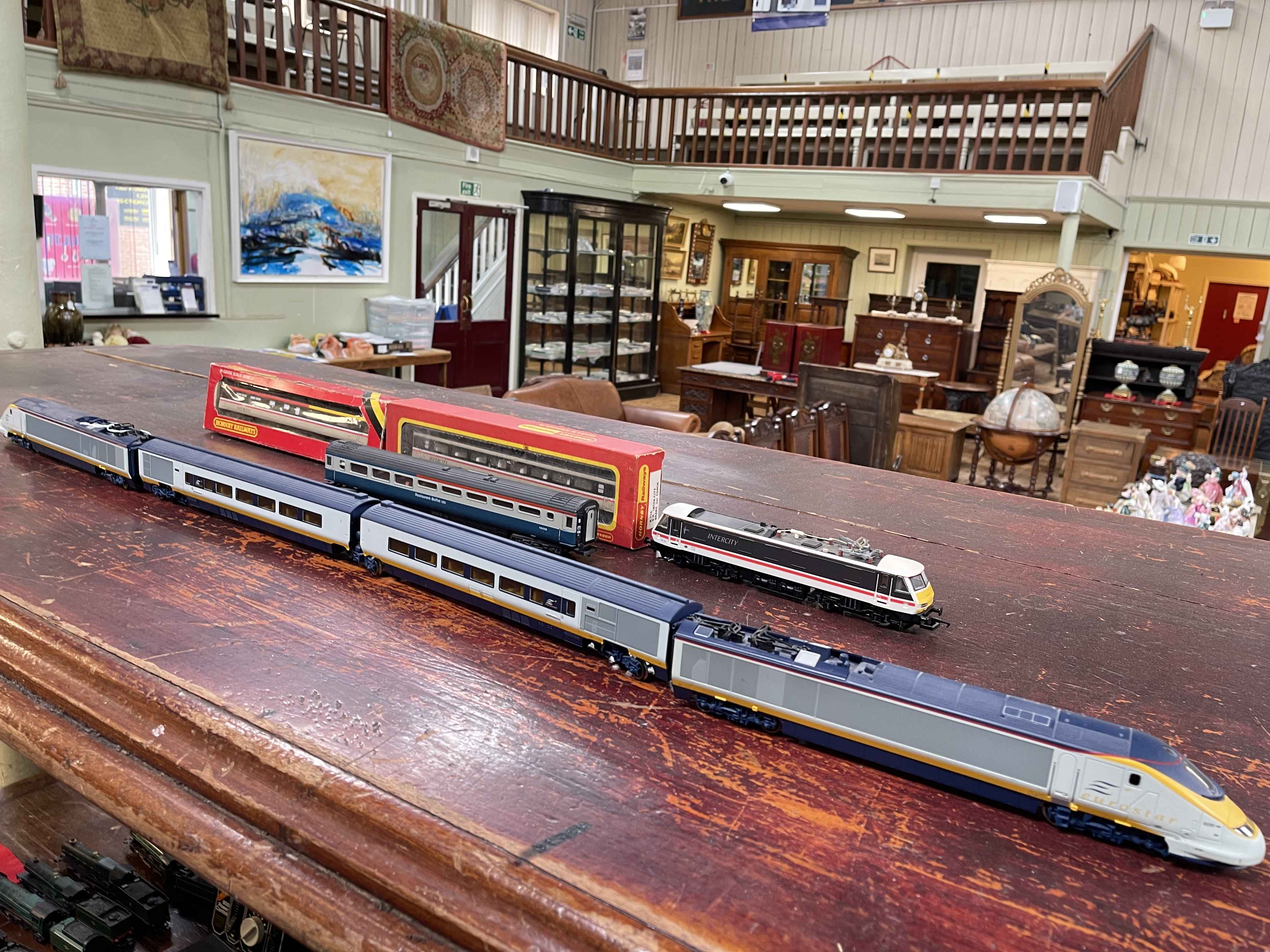 Hornby Eurostar locomotives with two carriages, Intercity electric locomotive and two coaches.