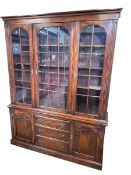 Bevan Funnell Ltd? oak cabinet bookcase having three glazed panel doors above three central drawers