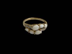 Opal and diamond 9 carat gold ring, size U.