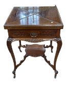 Late Victorian/Edwardian mahogany envelope card table having frieze drawer and on carved cabriole