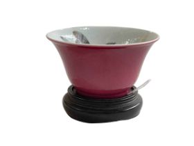 Chinese tea bowl decorated with insect and famille rose on wood stand, 6cm including stand.