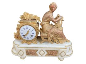 Ornate alabaster and ormolu mantel clock mounted with seated lady, 32cm high.