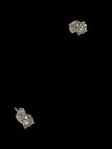 Pair of 18 carat white gold and diamond stud earrings, 1.02 carats.
