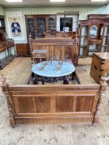 Carved French walnut double bedstead and two matching marble topped pedestals.