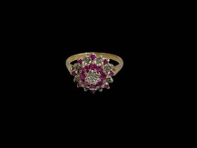 Ruby and diamond cluster 9 carat gold ring, size M.
