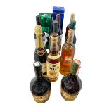 Twelve bottle of wine and spirits including Bell's Extra Special 70cl, Croft Original Sherry 750ml,