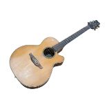 Acoustic guitar with label Takamine.