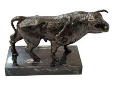 Bronzed metal bull, 28cm length.