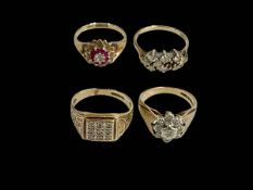 Four 9 carat gold gem set rings.