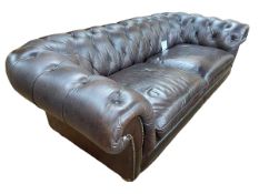 Chocolate brown deep buttoned leather Chesterfield settee, 241cm.