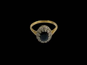 Sapphire and diamond 18 carat gold ring, size P.