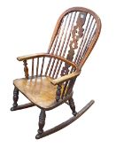 Antique Windsor pierced splat back rocking chair.