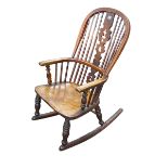 Antique Windsor pierced splat back rocking chair.