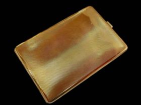 9 carat gold engine turned cigarette case, 12cm by 8.5cm.