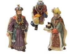 Three china figures of the Three Kings, made in China, tallest 30cm.