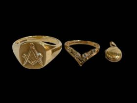 9 carat gold Masonic ring together with 9 carat gold and diamond ring, and a tiny locket (3).