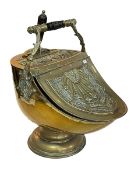 Art Nouveau style brass coal scuttle with handle, 52cm high.