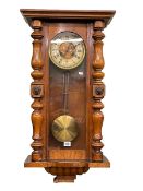 Victorian walnut cased Vienna style wall clock.
