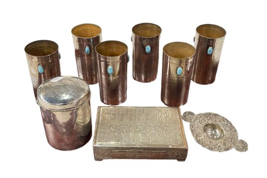 Set of six metal beakers, two boxes and tea strainer.