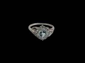 9 carat white gold aquamarine coloured cluster ring, size U.