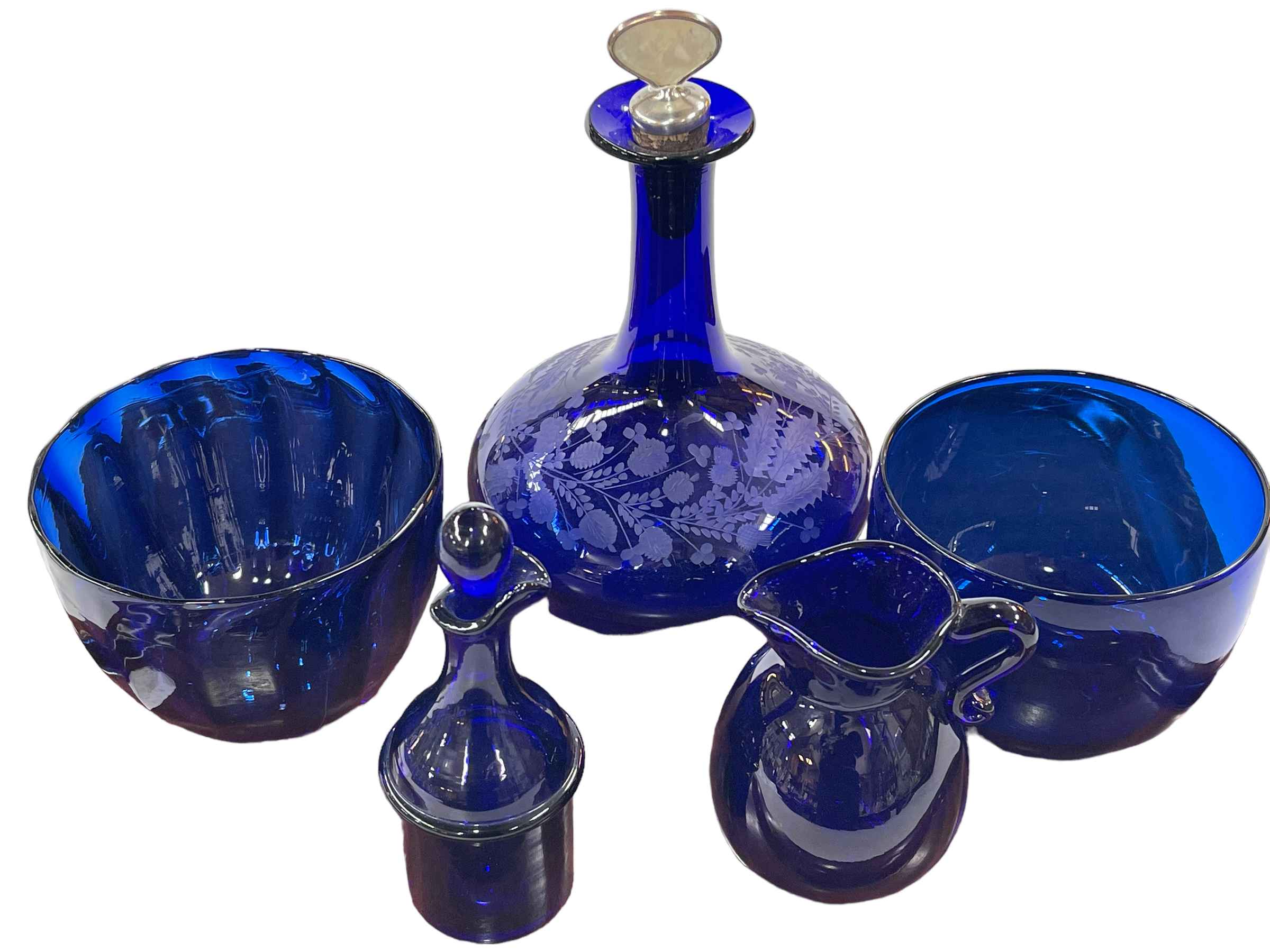 Bristol Blue glass decanter, two finger bowls, jug and cruet bottle.