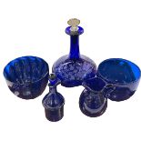 Bristol Blue glass decanter, two finger bowls, jug and cruet bottle.