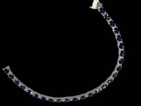 18 carat white gold, sapphire and diamond bracelet, sapphires 11.50 carats, diamonds 0.46, 17.