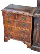 Neat Georgian style burr and mahogany chest of two short above three long drawers on bracket feet,
