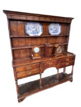 Georgian oak five drawer potboard dresser and Delft rack, 197cm by 182cm by 42cm.