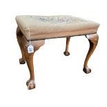 Chippendale style stool on ball and claw legs with floral tapestry seat, 46cm by 57.5cm by 41.5cm.