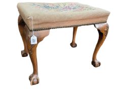Chippendale style stool on ball and claw legs with floral tapestry seat, 46cm by 57.5cm by 41.5cm.