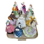 Twelve Royal Doulton figurines including The Young Master, The Orange Lady, Priscilla.