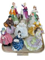 Twelve Royal Doulton figurines including The Young Master, The Orange Lady, Priscilla.
