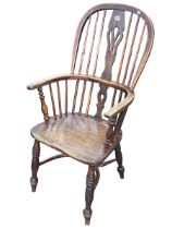 Antique Windsor pierced splat back elbow chair with crinoline stretcher.