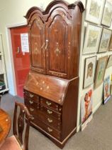 Rosewood and brass inlaid double arched top bureau writing cabinet with well fitted interior,