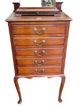 Edwardian mahogany six drawer music cabinet on cabriole legs, 106cm by 52cm by 36cm.
