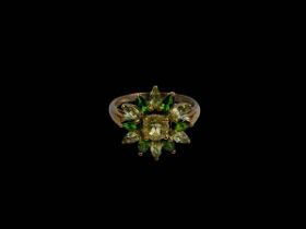 9 carat gold green/yellow stone flower cluster ring, size U.