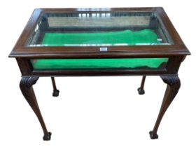 Chippendale style mahogany bijouterie table on carved cabriole legs to ball and claw feet,